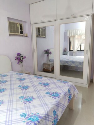 Bedroom in 2 BHK Apartment at K Raheja Palm Court, Malad West – for Rent