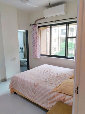 Bedroom in 2 BHK Apartment at K Raheja Palm Court, Malad West – for Rent