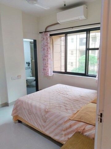 Bedroom in 2 BHK Apartment at K Raheja Palm Court, Malad West – for Rent