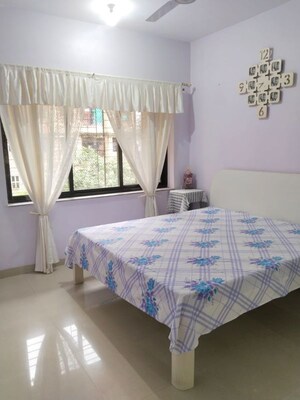 Bedroom in 2 BHK Apartment at K Raheja Palm Court, Malad West – for Rent