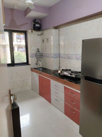 Kitchen in 2 BHK Apartment at K Raheja Palm Court, Malad West – for Rent