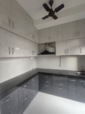 Kitchen in 2 BHK Apartment at Ashar Metro Towers, Vartak Nagar – for Rent