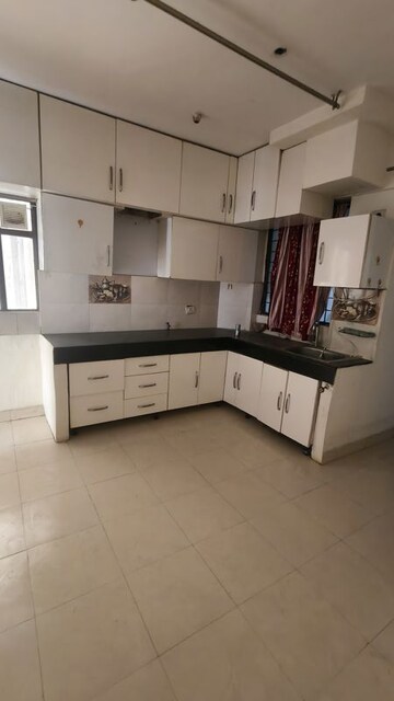Kitchen in 2 BHK Apartment at OP Floridaa, Sector 82 – for Rent