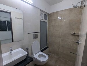 Bathroom in 1 BHK Apartment at Omkar Signet, Malad East – for Rent