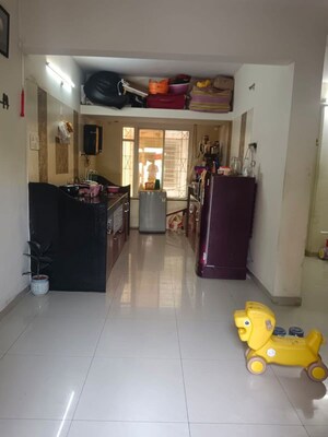 Living Room in 1 BHK Apartment at GK Rose Icon, Pimple Saudagar – for Rent