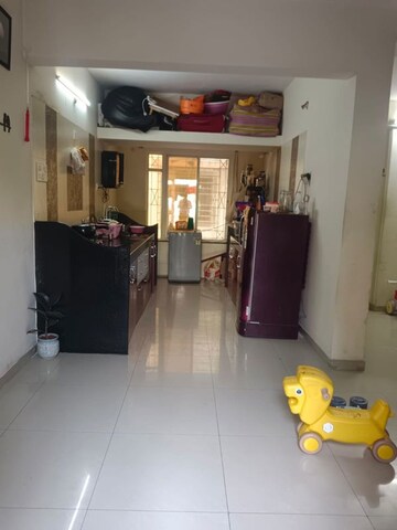 Living Room in 1 BHK Apartment at GK Rose Icon, Pimple Saudagar – for Rent