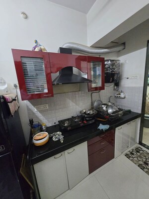 Kitchen in 1 BHK Apartment at Lalani Residency, Kavesar – for Rent
