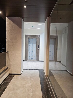 Building Lobby in 1 BHK Apartment at Aum Vertex, Rahatani – for Rent