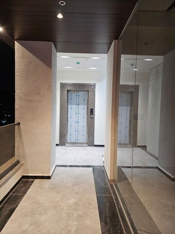 Building Lobby in 1 BHK Apartment at Aum Vertex, Rahatani – for Rent