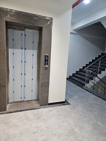 Building Lobby in 1 BHK Apartment at Aum Vertex, Rahatani – for Rent