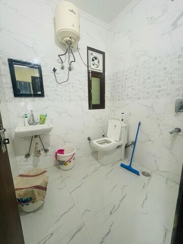 Bathroom in 1 BHK Builder Floor at Ansal Sushant Lok I, Sector 43 – for Rent