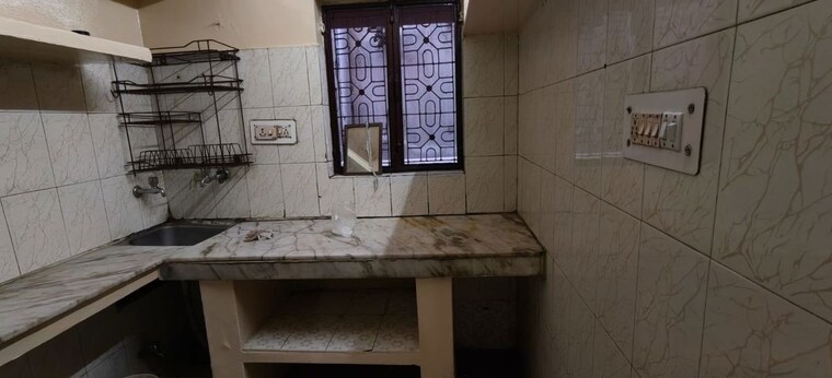 Kitchen, paschim vihar 2 Bedroom 60 Sq.Yd. Apartment In Paschim Vihar Delhi 9844155