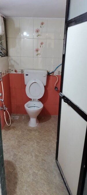 Bathroom in 2 BHK Apartment at Jawaharban CHS, Andheri West – for Rent