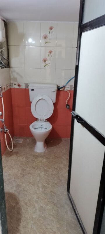 Bathroom in 2 BHK Apartment at Jawaharban CHS, Andheri West – for Rent