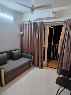 Living Room in 1 BHK Apartment at Godrej Hillside, Mahalunge – for Sale