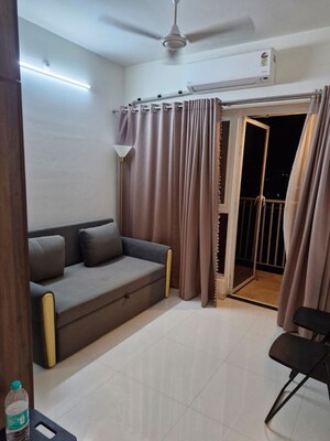 Living Room in 1 BHK Apartment at Godrej Hillside, Mahalunge – for Sale