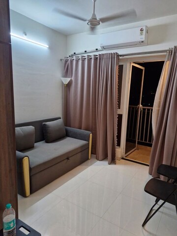 Living Room in 1 BHK Apartment at Godrej Hillside, Mahalunge – for Sale