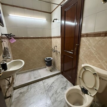 Bathroom in 3 BHK Apartment at Jangpura – for Rent