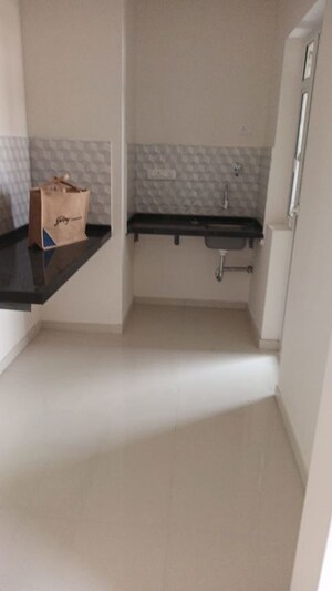 Kitchen in 1 BHK Apartment at Godrej Hillside, Mahalunge – for Sale