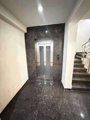 Building Lobby in Studio Builder Floor at Green Wood City, Sector 45 – for Rent