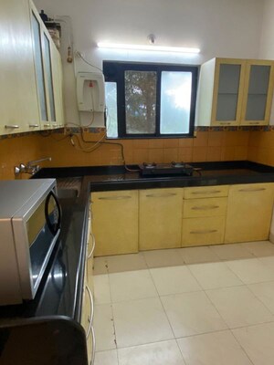 Kitchen in 3 BHK Apartment at Kumar Sophronia, Kalyani Nagar – for Sale