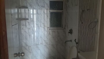 Bathroom in 2.5 BHK Apartment at Amrapali Princely Estate, Sector 76 – for Sale