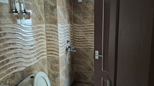 Bathroom in 2.5 BHK Apartment at Amrapali Princely Estate, Sector 76 – for Sale