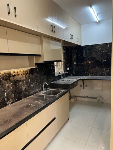 Kitchen in 2 BHK Apartment at Bhartiya Nikoo Homes, Thanisandra Main Road – for Rent