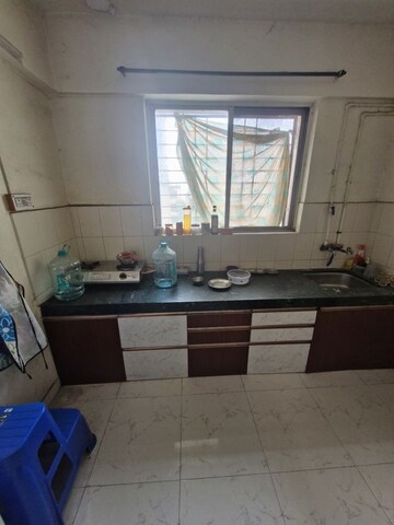 Kitchen in 1 BHK Apartment at Parmar Square, Kharadi – for Rent