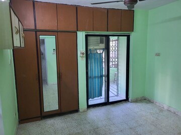 Room in 2 BHK Apartment at Panchavati CHS, Vasant Vihar – for Rent