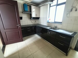 Kitchen in 3 BHK Apartment at Unitech The Residences Gurgaon, Sector 33 – for Rent