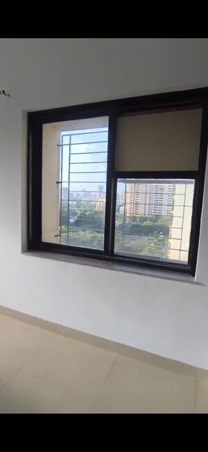 Room in 2 BHK Apartment at K Raheja Palm Court, Malad West – for Rent