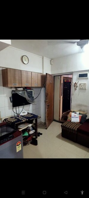 Living Room in 1 BHK Apartment at Nav Dadar CHS, Dadar West – for Rent