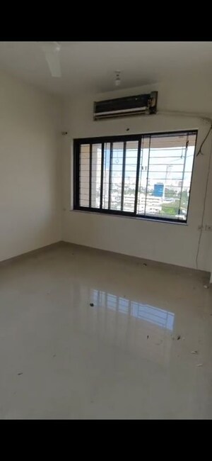 Bedroom in 2 BHK Apartment at K Raheja Palm Spring, Malad West – for Rent