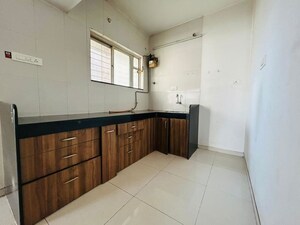 Kitchen in 2.5 BHK Apartment at Paranjape Schemes Madhukosh, Dhayari – for Sale