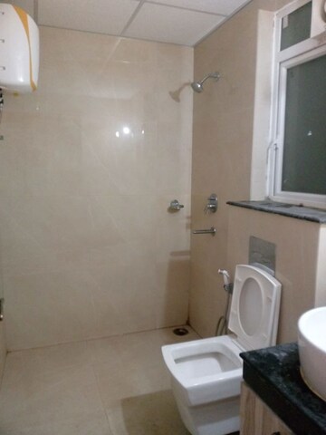 Bathroom in 3 BHK Apartment at Rishita Manhattan, Gomti Nagar – for Rent