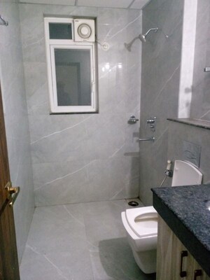 Bathroom in 3 BHK Apartment at Rishita Manhattan, Gomti Nagar – for Rent