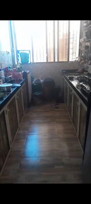 Kitchen in 2 BHK Apartment at Vighnahatra Modern Enclave, Agripada – for Sale