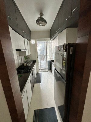 Kitchen in 2 BHK Apartment at Courtyard by Narang Realty and The Wadhwa Group, Pokhran Road No Two – for Rent