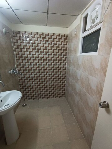 Bathroom in 2 BHK Apartment at Gaur Yamuna City, Gaur Yamuna City – for Rent