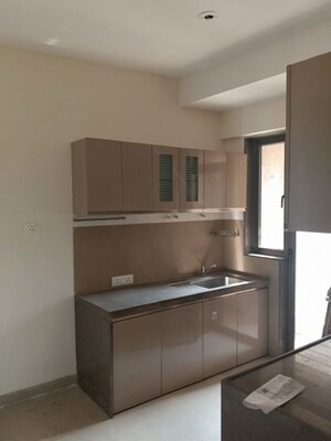 Kitchen in 2.5 BHK Apartment at Bhimjyani Verraton, Manpada – for Rent