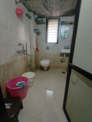 Bathroom in 2 BHK Apartment at Pratika Apartment, Samata Nagar – for Rent