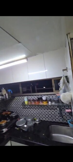 Kitchen in 1 BHK Apartment at Arok Sunshine CHS, Agripada – for Sale