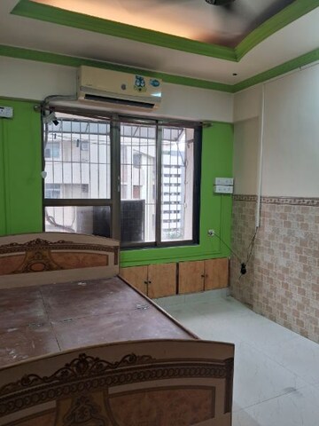 Bedroom in 2 BHK Apartment at Cosmic Heights, Bhakti Park – for Rent