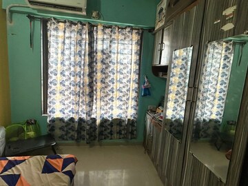 Living Room in 1 BHK Apartment at Lalani Residency, Kavesar – for Rent