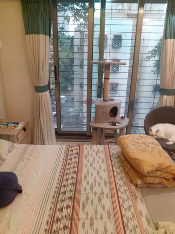 Living Room in 2 BHK Apartment at K Rahega Palm Springs, Malad West – for Rent