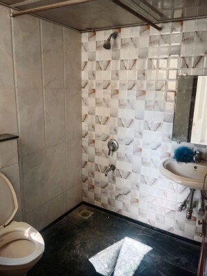 Bathroom in 3 BHK Apartment at Ashmita Apartments, Khar West – for Rent