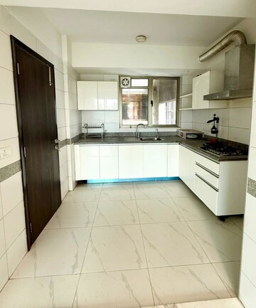 Kitchen in 4 BHK Apartment at Tata Primanti Villas, Sector 72 – for Rent