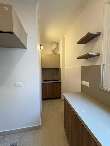 Kitchen in 4 BHK Builder Floor at Ansal API Esencia, Sector 67 – for Sale