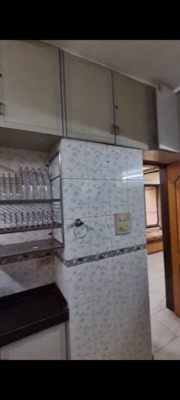 Kitchen in 1 BHK Apartment at Trimurti Krupa Apartment, Vile Parle East – for Rent